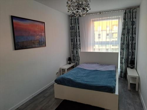 Postel nebo postele na pokoji v ubytování Apartament Morski