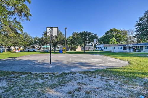 an empty basketball court with a basketball hoop at Walk to Shore Myrtle Beach House with Private Deck! in Myrtle Beach