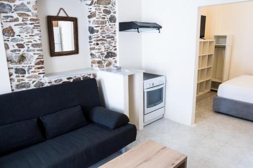 Giường trong phòng chung tại Or Noir Suites