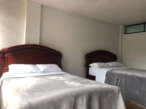 Cama o camas de una habitación en Comfort City Apartment 2 bedroom 2 bathroom
