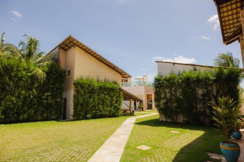 Κήπος έξω από το Pousada SandBeach