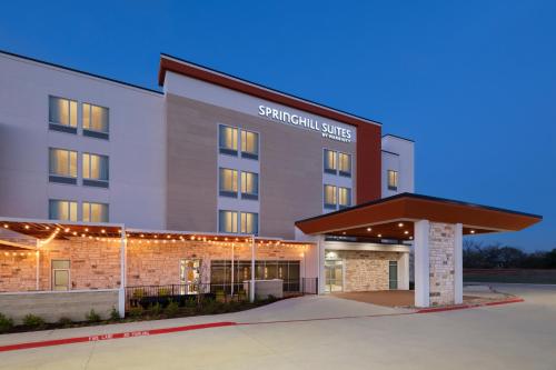 a rendering of the front of a hotel building at SpringHill Suites by Marriott Weatherford Willow Park in Willow Park