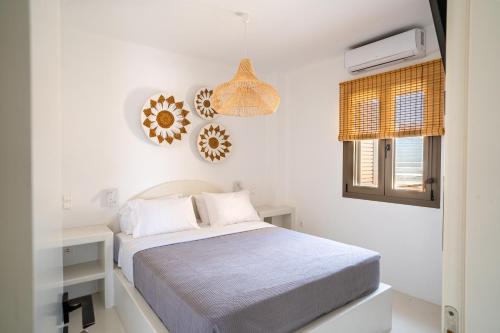 Postel nebo postele na pokoji v ubytování Saint Nicholas Resort - Villas