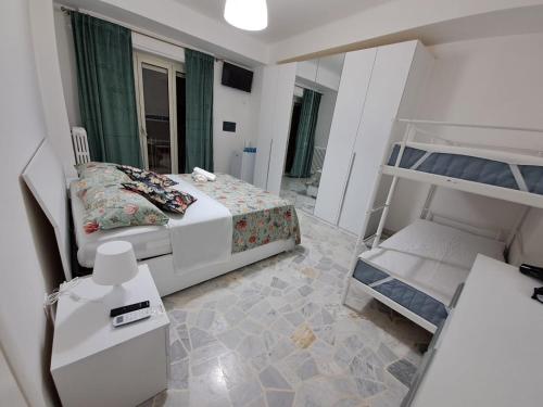 Postel nebo postele na pokoji v ubytování Goffredo Mameli House