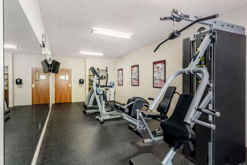 a gym with treadmills and elliptical machines at Best Western Plus New England Inn & Suites in Berlin