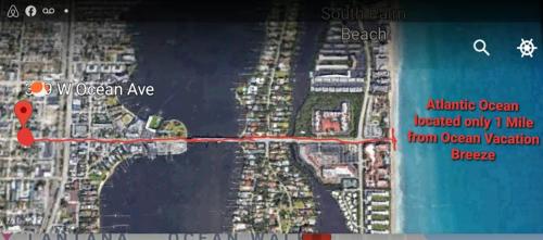 a map of a beach with a red line at OCEAN VACATION BREEZE in Lantana