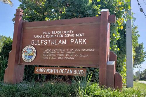 a sign for the gun east county parks and recreation department southeastern park at OCEAN VACATION BREEZE in Lantana