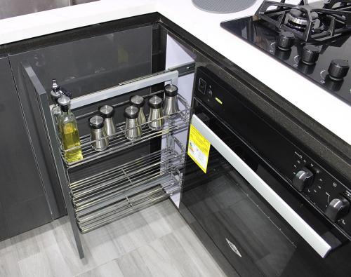 a kitchen with an open dishwasher with bottles and pans at TOCANCIPÁ, Increíble, Hermoso y Moderno APARTAMENTO COMPLETO! in Tocancipá