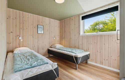 מיטה או מיטות בחדר ב-Cozy Home In Nex With Kitchen