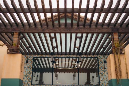 a room with two doors and a ceiling at The Cove Hotel in Long Beach