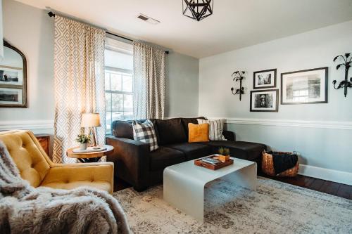 a living room with a couch and a table at East Stevens Home in Culpeper