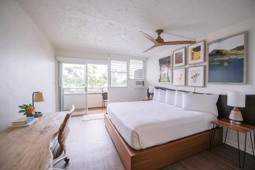 Postel nebo postele na pokoji v ubytování SCP Hilo Hotel