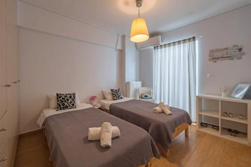 Posteľ alebo postele v izbe v ubytovaní Apartment in the Historical Center of Athens