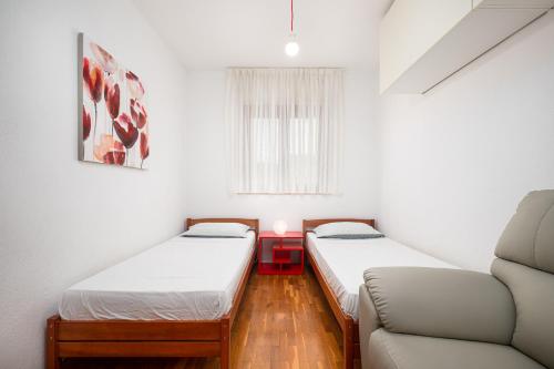 Krevet ili kreveti u jedinici u objektu Sea View Apartment - Roberto