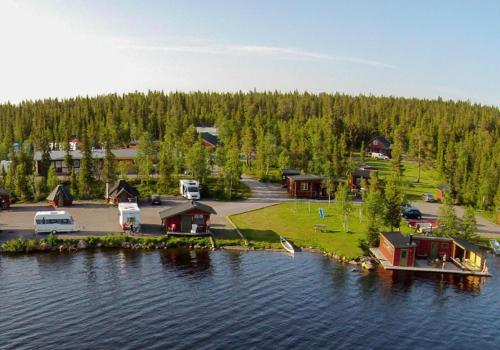 an island in the middle of a body of water at Camp Alta Kiruna in Kiruna