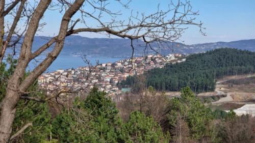 a view of a town on a hill at Happy Hobbit ,2 room jakuzi, Lake view, fireplace in Sapanca 1 in Sapanca