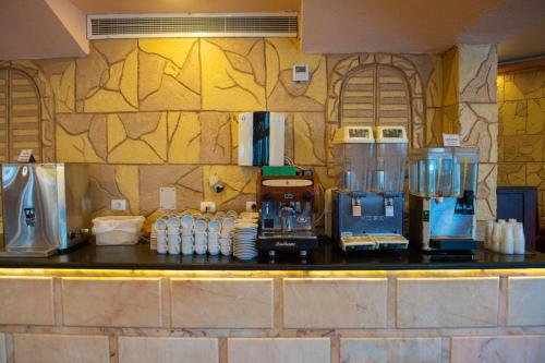 a kitchen with a counter with several machines on it at Happy Life Village Dahab in Dahab