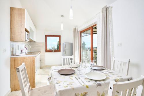 Afbeelding uit fotogalerij van Elia Apartments in Savudrija