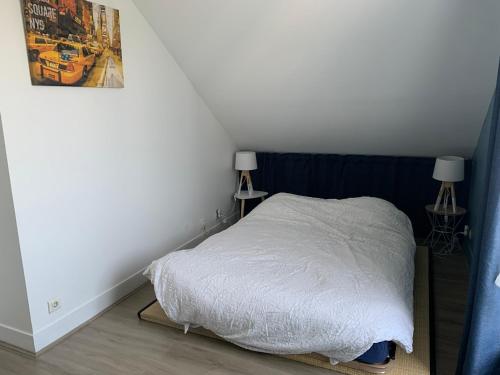 Postel nebo postele na pokoji v ubytování Chambre cosy à Houilles