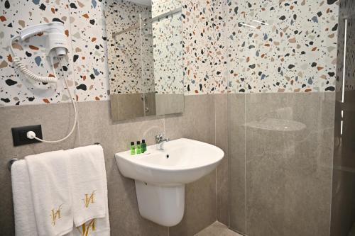 Koupelna v ubytování Hotel Vino