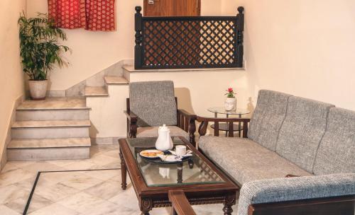 Zona de estar de Swaroop Vilas - Lake Facing Boutique Hotel