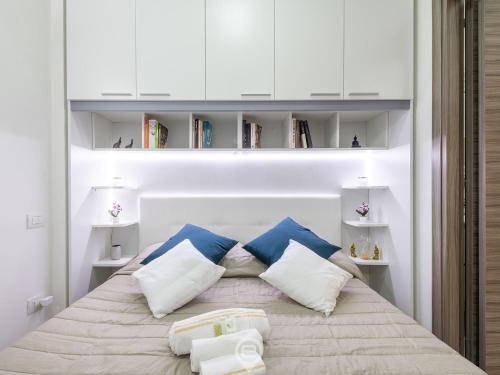 Кровать или кровати в номере Zaffiro Apartment