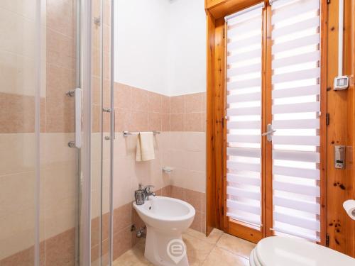 Ванная комната в Zaffiro Apartment