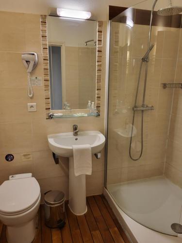 Ванная комната в Hôtel La Flambée