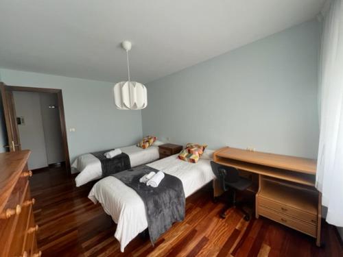 Cama o camas de una habitación en playa Santa Cristina