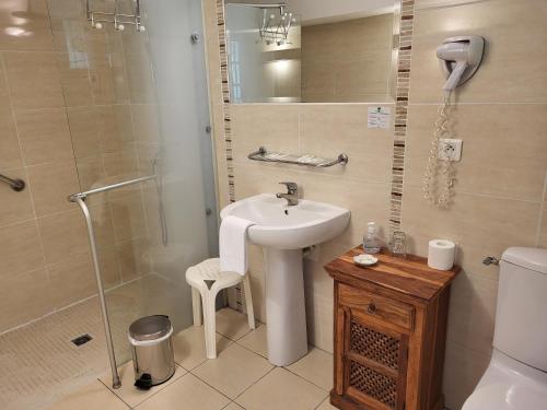 Ванная комната в Hôtel La Flambée