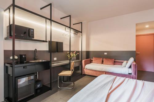 a hotel room with a bed and a sink at MARCANTONIO HOME ROME - Vatican - in Rome