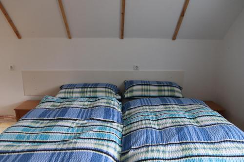 Cama o camas de una habitación en Ferienhaus Karl