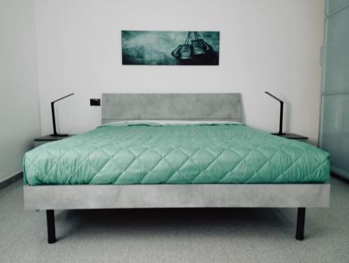 Posteľ alebo postele v izbe v ubytovaní Casa Relax Diano Castello
