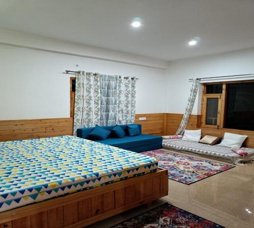 Ishan Log Huts-A boutique home stayにあるベッド