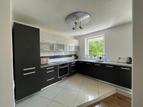 Dapur atau dapur kecil di Bagoly Apartman