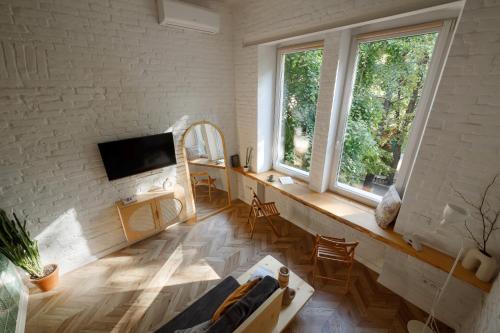 TV a/nebo společenská místnost v ubytování Passage Apartment