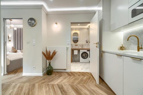 Postel nebo postele na pokoji v ubytování Apartments Ostsee Suntowers TARAS