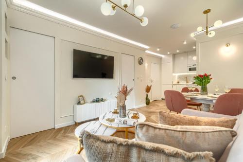 TV a/nebo společenská místnost v ubytování Apartments Ostsee Suntowers TARAS
