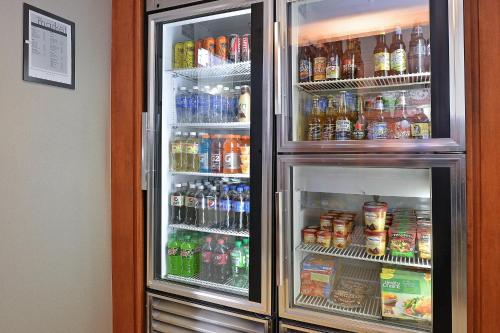 a refrigerator filled with lots of different types of drinks at Residence Inn by Marriott Denver Airport at Gateway Park in Aurora