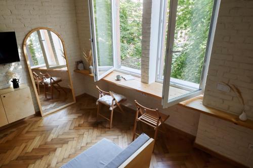 TV a/nebo společenská místnost v ubytování Passage Apartment