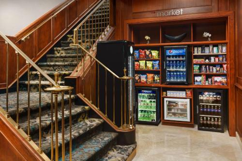 a spiral staircase in a store with a refrigerator at Residence Inn Atlanta Downtown in Atlanta