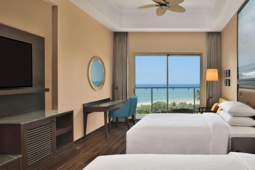 Postel nebo postele na pokoji v ubytování Sheraton Kosgoda Turtle Beach Resort