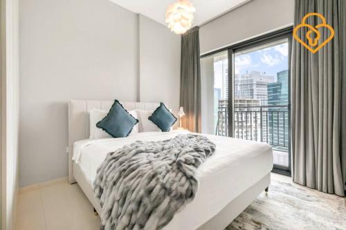 Postel nebo postele na pokoji v ubytování Keysplease New 1 BR Apt Business Bay, Zada Tower