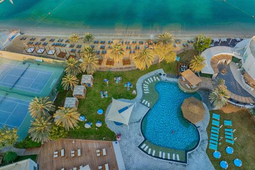 an aerial view of a resort with a swimming pool at Le Meridien Abu Dhabi Resort in Abu Dhabi