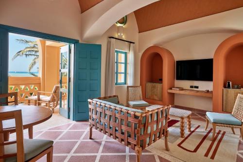 a living room with a view of the ocean at Sheraton Miramar Resort El Gouna in Hurghada