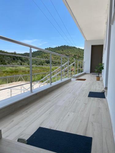 a balcony with a view of a mountain at Maurizio's Villa in Yiáltra