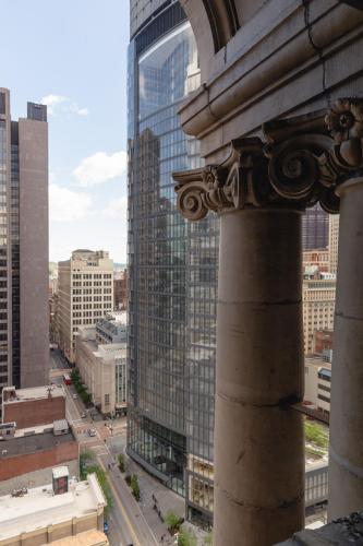 a view of a city with a tall building at The Industrialist Hotel, Pittsburgh, Autograph Collection in Pittsburgh