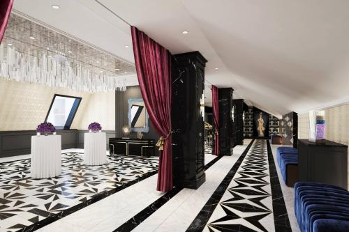 a lobby with black and white floors and red curtains at The LaSalle Chicago, Autograph Collection by Marriott in Chicago