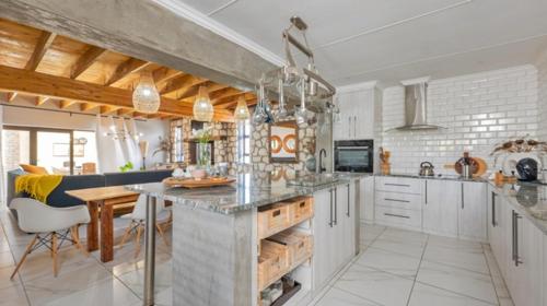 Kuchyň nebo kuchyňský kout v ubytování Easy Going Beach House