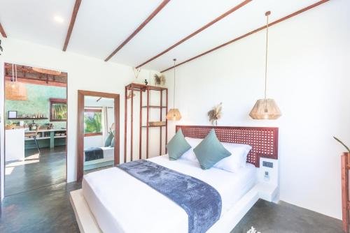 Postel nebo postele na pokoji v ubytování Tanaw Villas